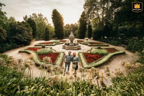 Against the setting sun, the couple enjoys the beautiful gardens of the Jardins do Palácio de Cristal in Porto, Portugal.
